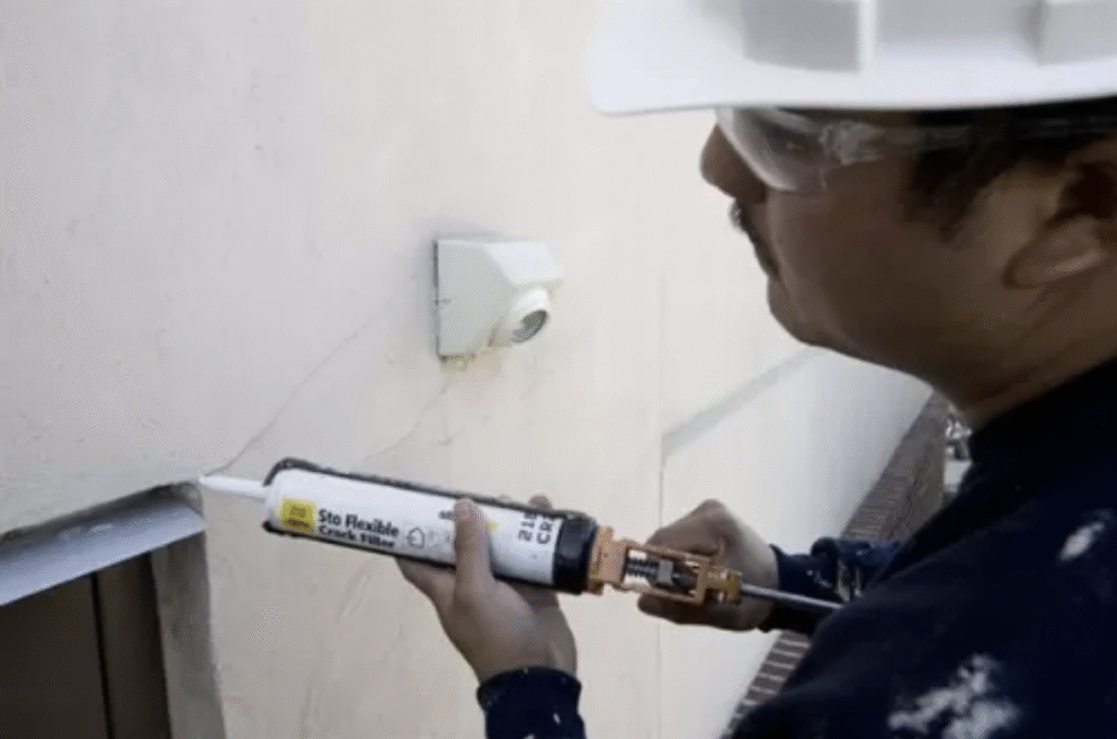 One of the US Exterior crew applying sealant